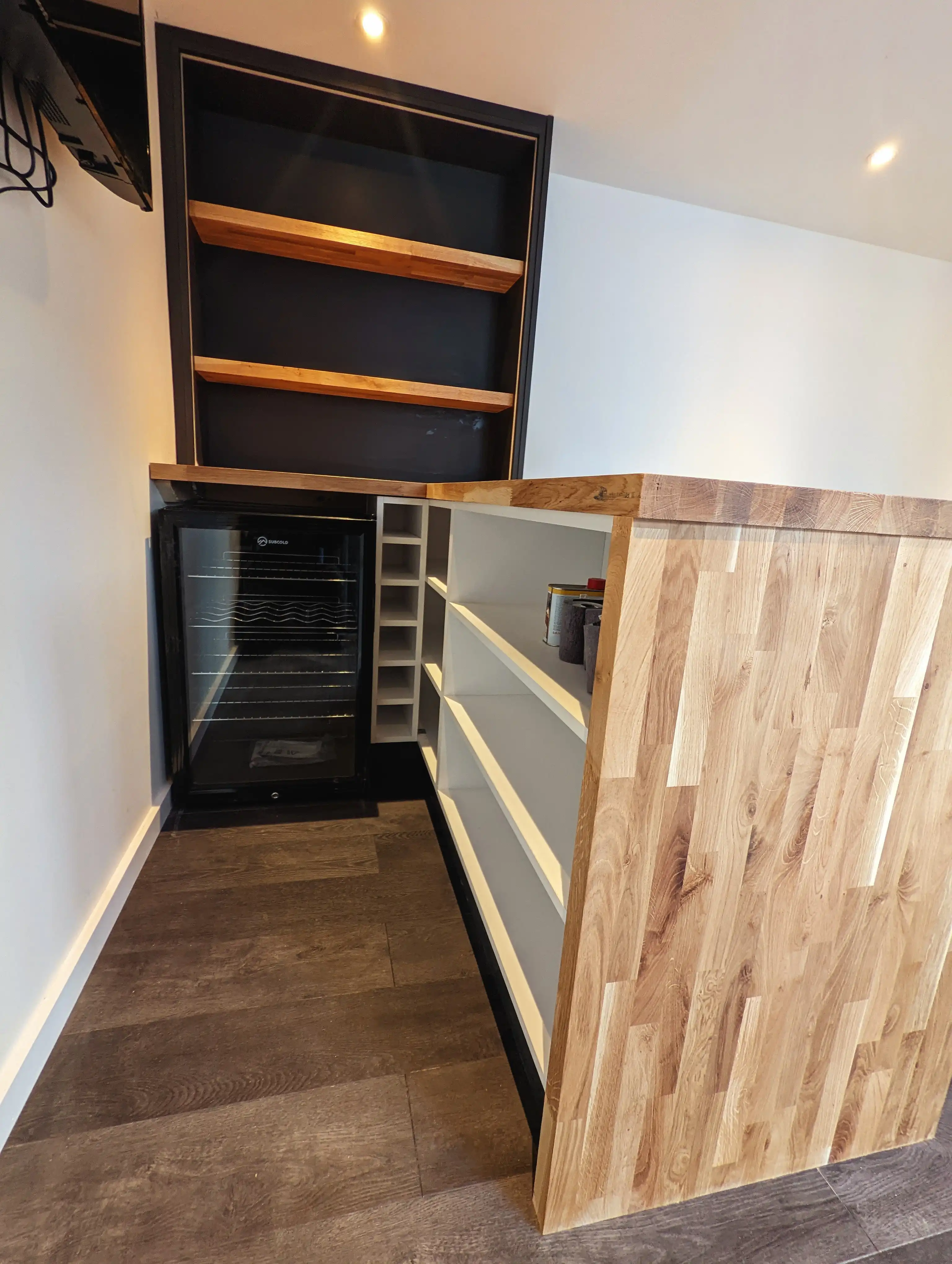 Examples of our company using joinery techniques to construct house extensions, bespoke furniture, wardrobes and media walls.